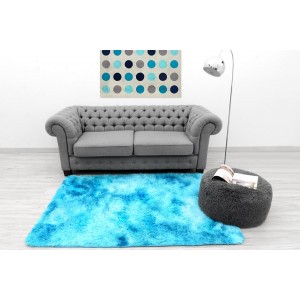 Ombre plyšový koberec modrej farby